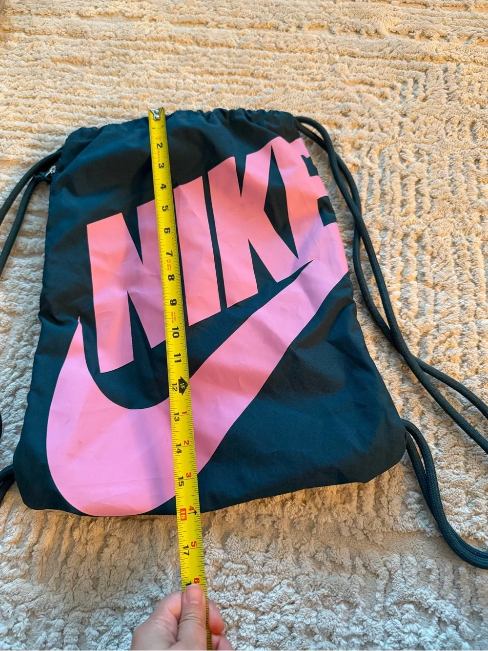 Nike Black Drawstring Backpack with Pink Logo